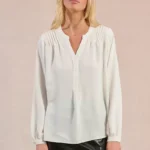 Blusa de manga larga detalles plisados