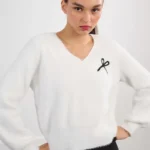 Jersey de manga larga abullonada estampado lazo
