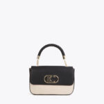 bolso bandolera con solapa efecto bicolor Lola Casademunt